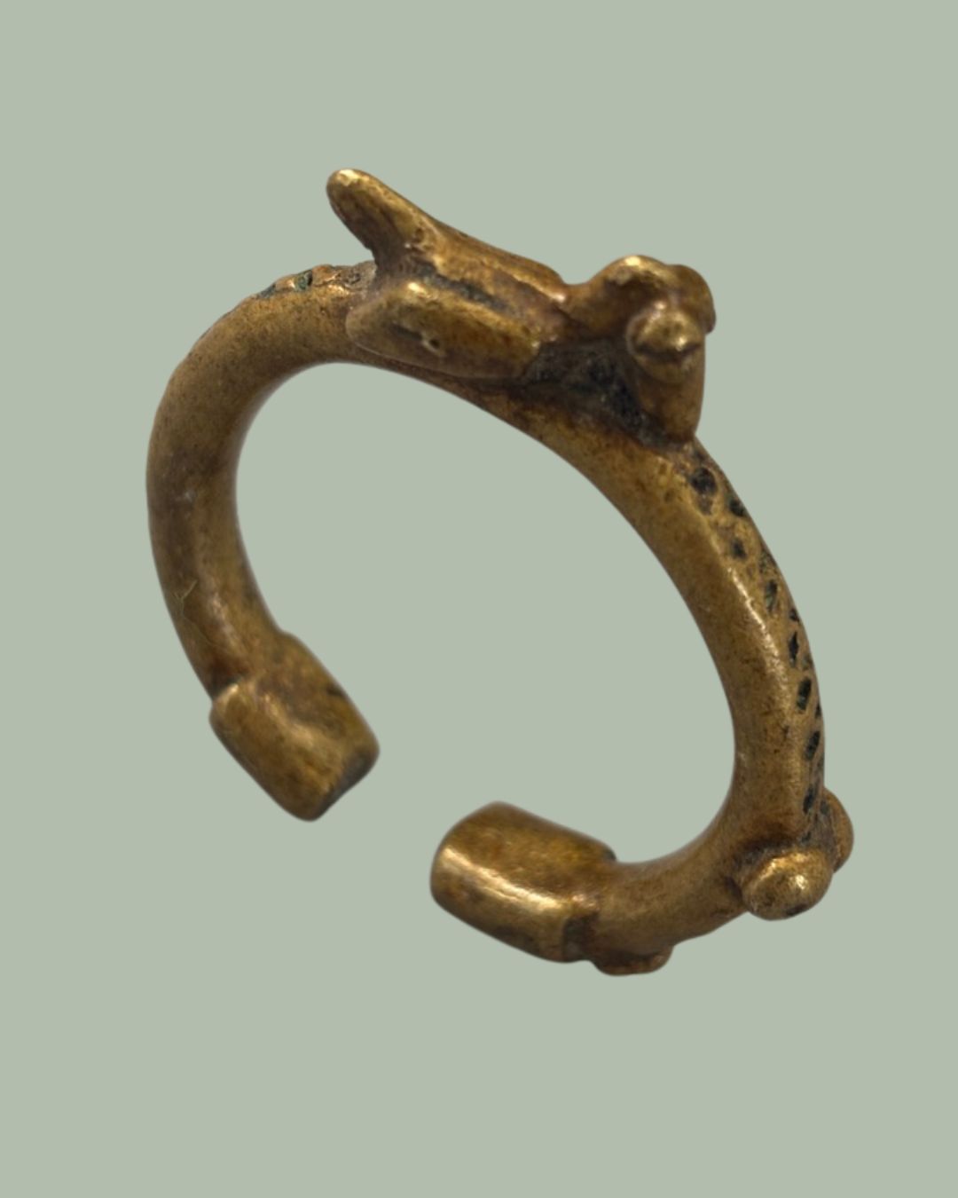 Manilla bracelet with bird finial,Akan / Ashanti Culture, Ghana, 19th to early 20th century