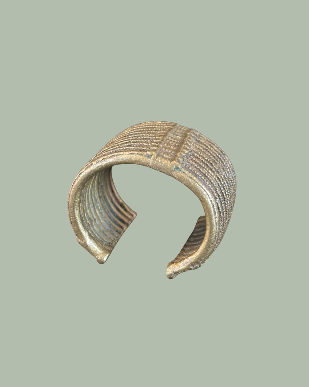 EG 026 – Cast Bronze Lobi Currency Bracelet