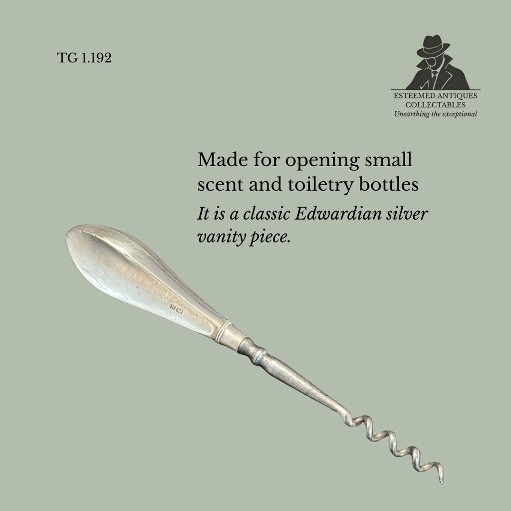 Sterling silver scent / perfume bottle corkscrew by Cohen & Nathan, hallmarked Birmingham 1912, an Edwardian vanity tool for opening perfume or scent bottles.