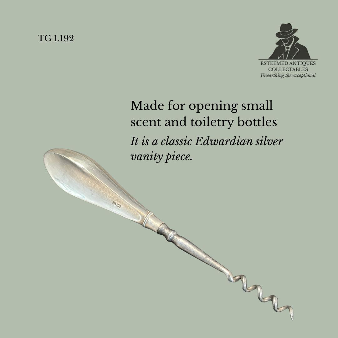Sterling silver scent / perfume bottle corkscrew by Cohen & Nathan, hallmarked Birmingham 1912, an Edwardian vanity tool for opening perfume or scent bottles.