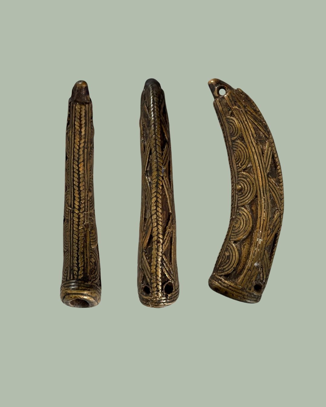 Antique Akan brass goldweight pendant from Ghana, 19th–20th century. Lost-wax cast Ashanti trade weight later worn as jewellery. Egon Guenther collection.