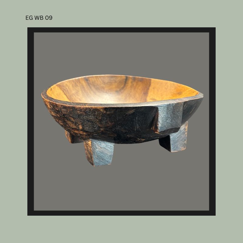 Zulu Tribal Wooden bowl with a natural finish on a gray background