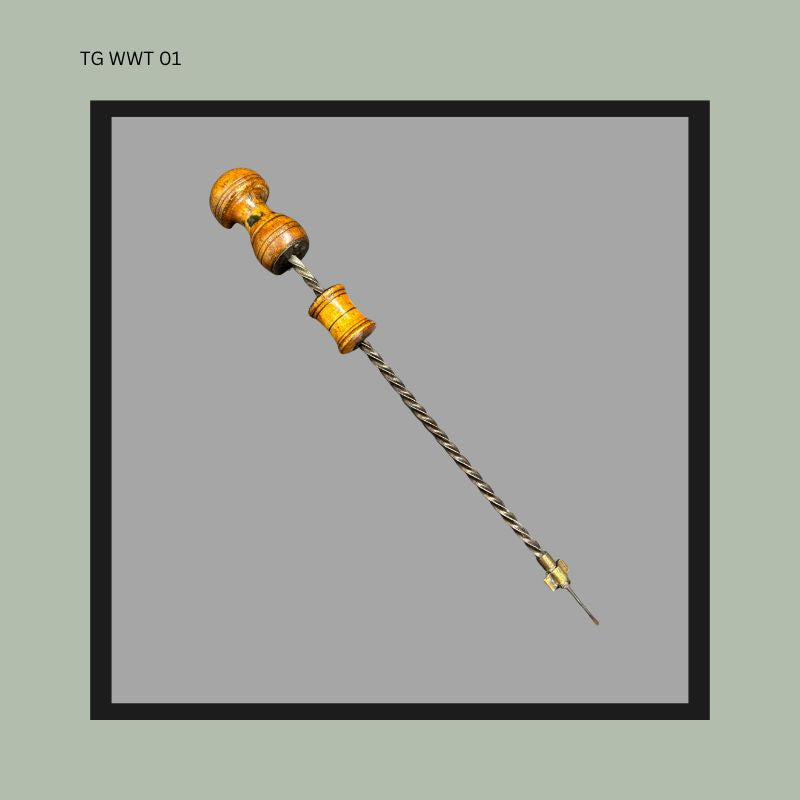 Wooden-handled tool with a metal shaft on a gray background