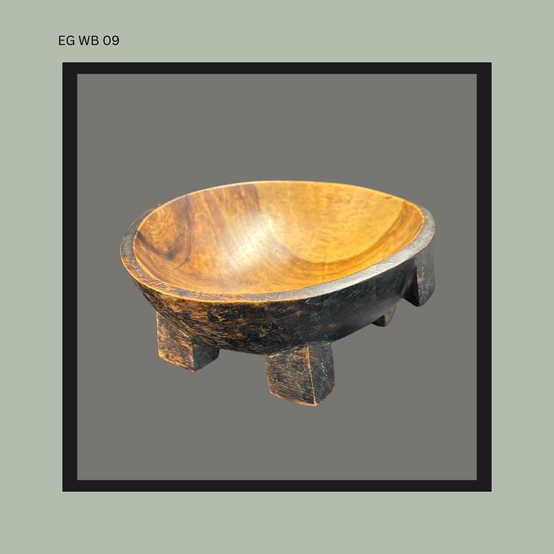 Small carved wooden footed bowl 