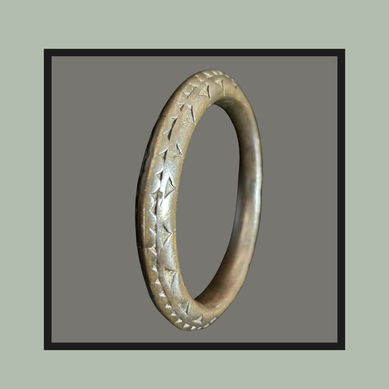 Heavy cast brass bracelet attributed to the Asante / Akan peoples of Ghana
