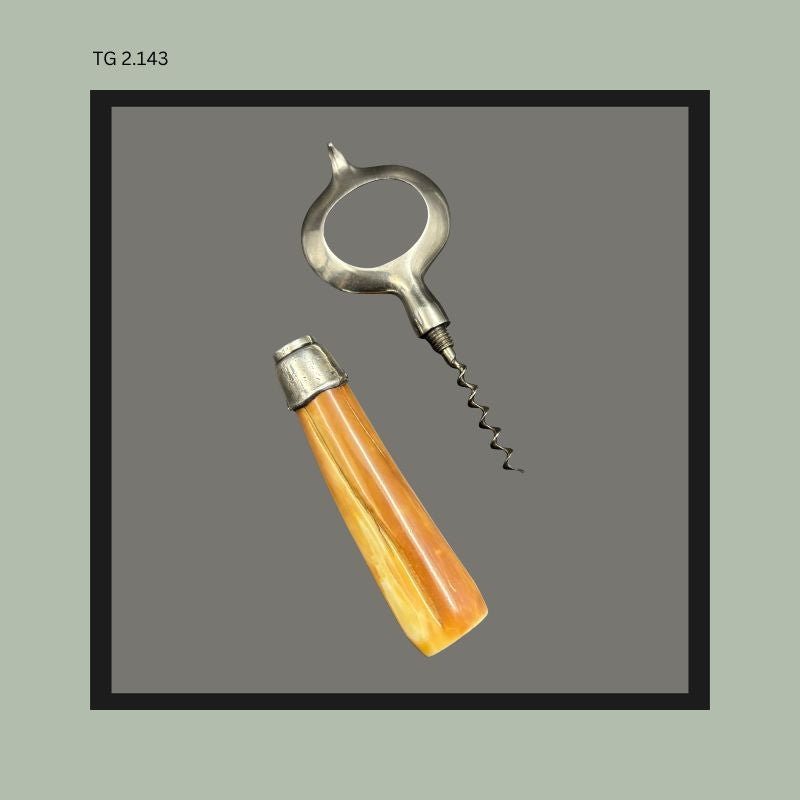 John Hasselbring patent 1906 American corkscrew with Baltimore Loop Seal opener, removable steel worm, sterling silver mounted ferrule, and tapered horn handle, shown disassembled against a neutral background from the Thomas Guenther