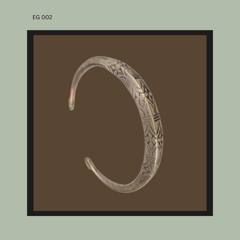 Silver Neck torque  - hooked terminals and engraved geometric motifs