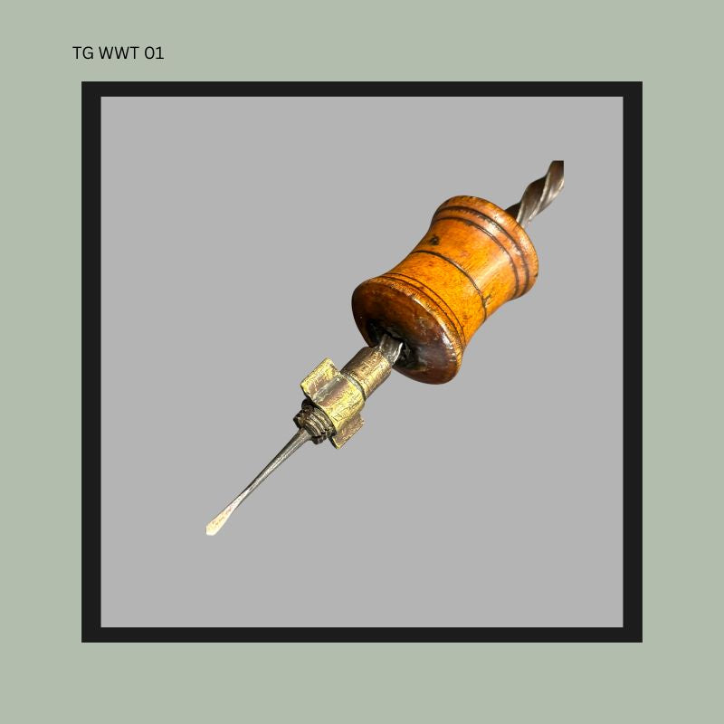 Vintage-style wooden drill showing front view of drill in chuck