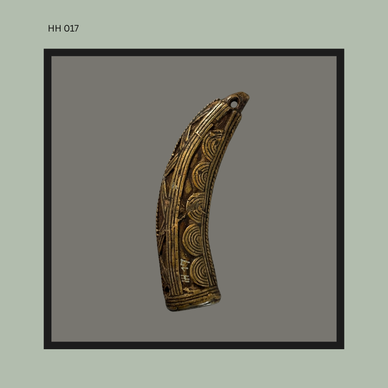 curved form, concentric motifs associated with Akan gold weight design.