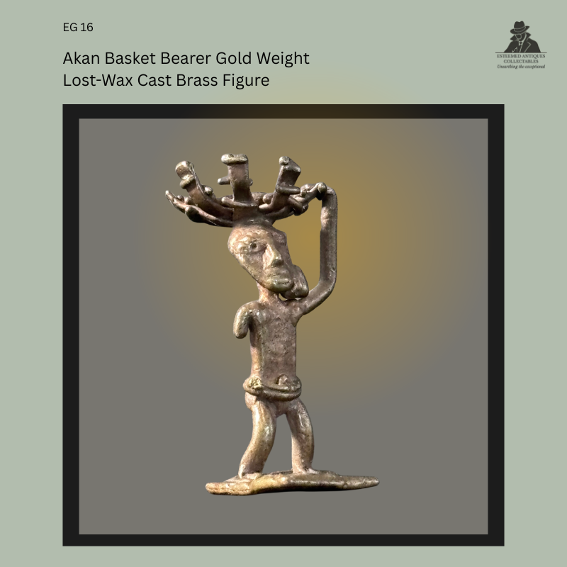 Front view of an Akan lost-wax cast brass gold weight depicting a standing basket bearer carrying a multi-pronged basket on the head while supporting it with one raised arm, Ghana, from the Egon Guenther Collection by family descent to the Thomas Guenther Collection.