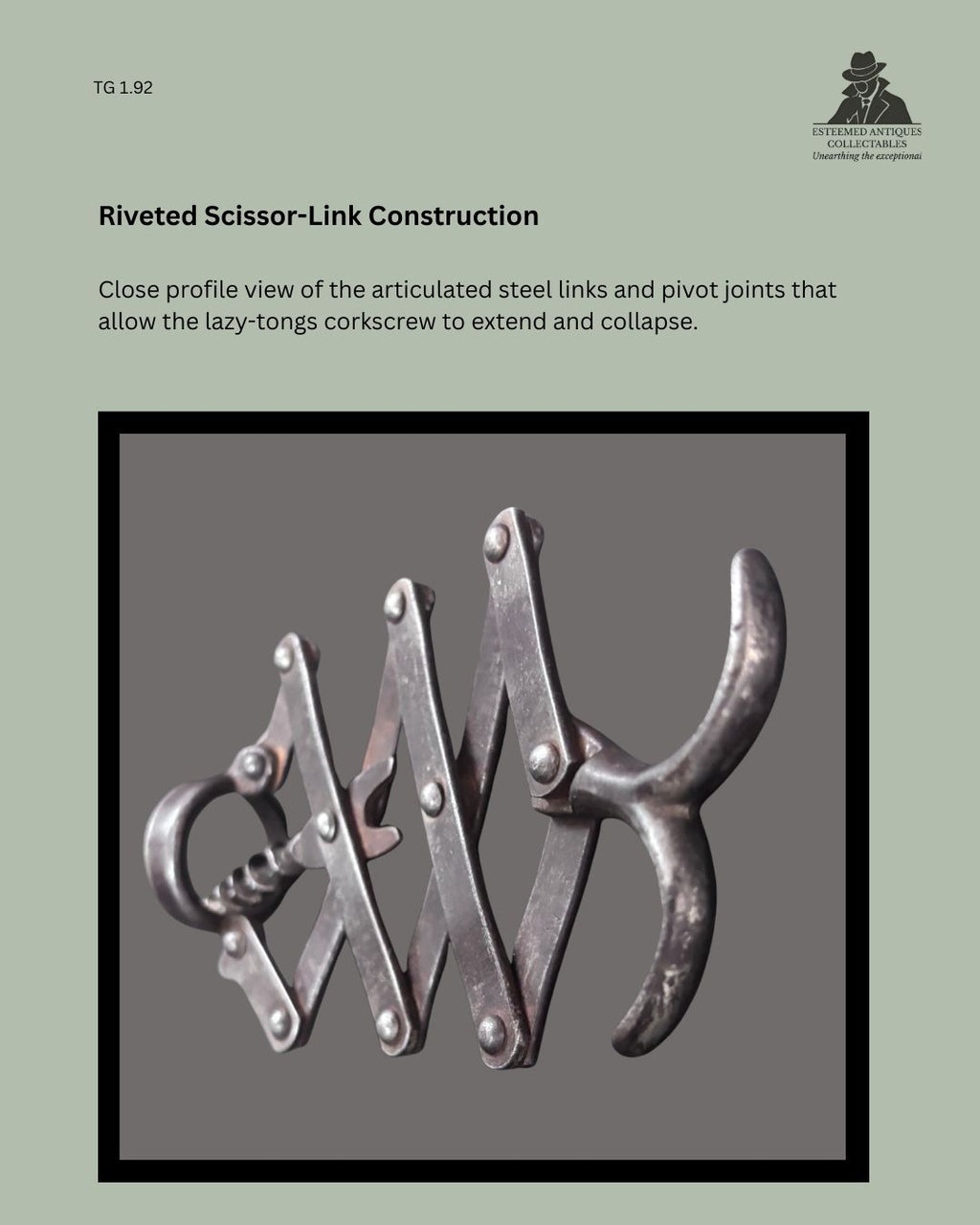 Close profile view of the antique lazy-tongs corkscrew showing its articulated steel scissor links, riveted pivot joints and folding mechanism in the extended position.