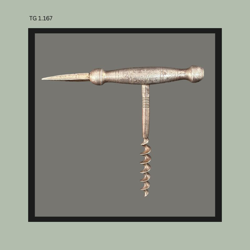 Antique metal T-handle corkscrew with integral pointed spike, featuring a turned handle and forged steel worm, likely intended as a combined wine and ice-breaking tool, from the Thomas Guenther Collection.