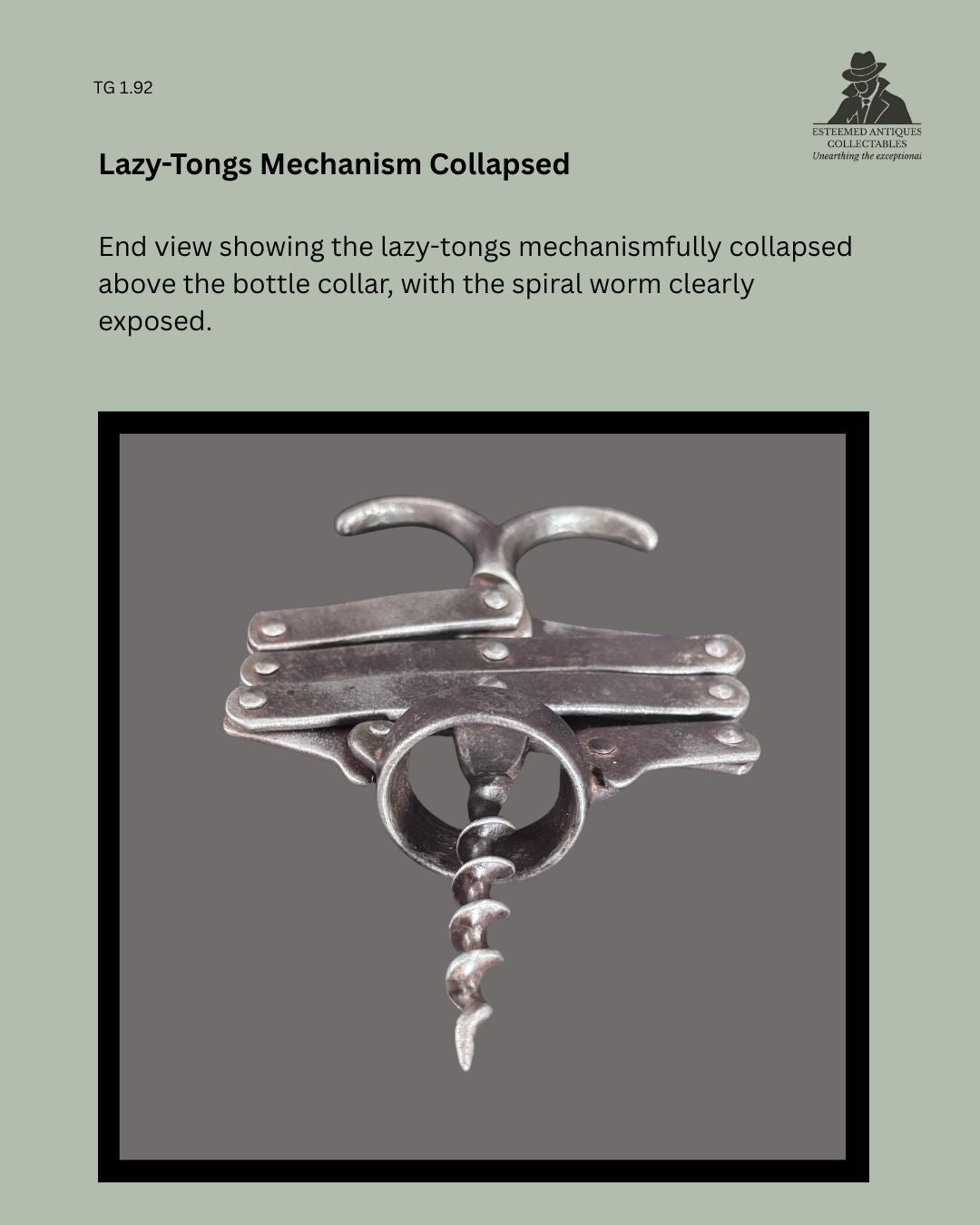 Collapsed view of an articulated zig-zag corkscrew, showing the compact folded metal linkage mechanism, handle and corkscrew worm.
