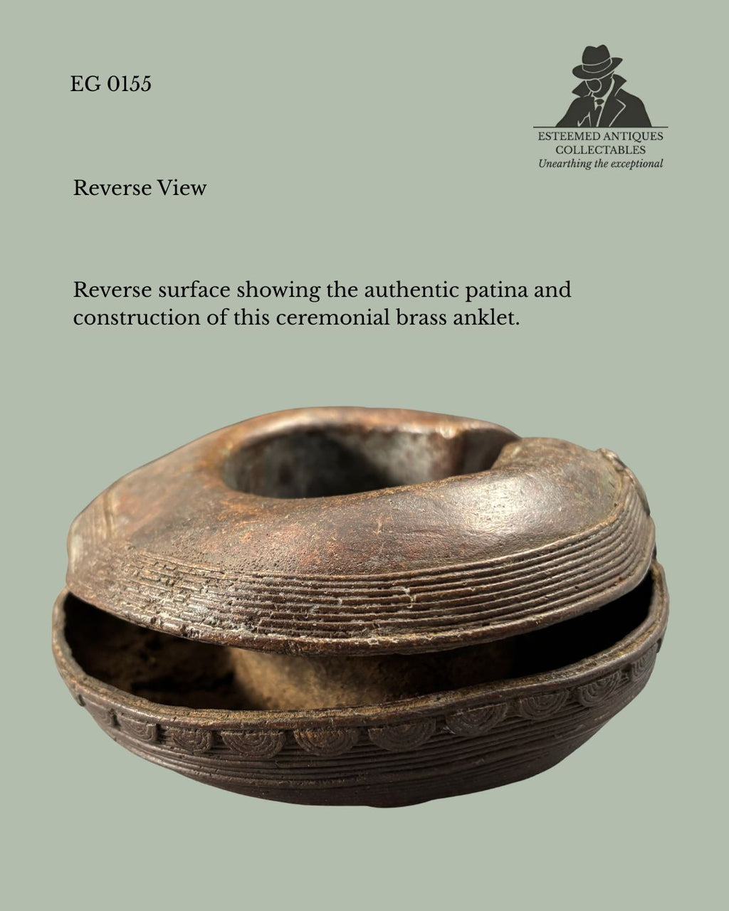 Reverse view of a Baoulé cast brass ceremonial anklet from Côte d'Ivoire, showing the authentic aged patina, interior construction, and finely incised linear decoration, from the Egon Guenther Collection.