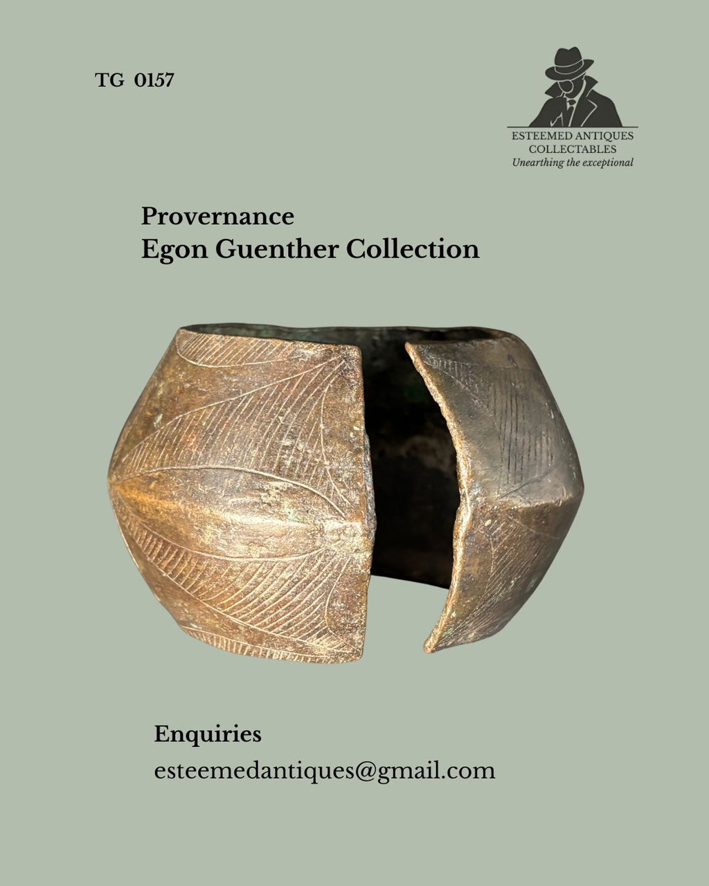 Cast brass Baoulé open anklet with broad geometric form and finely engraved linear decoration, Côte d'Ivoire, shown from the front with the opening visible, from the Egon Guenther Collection.