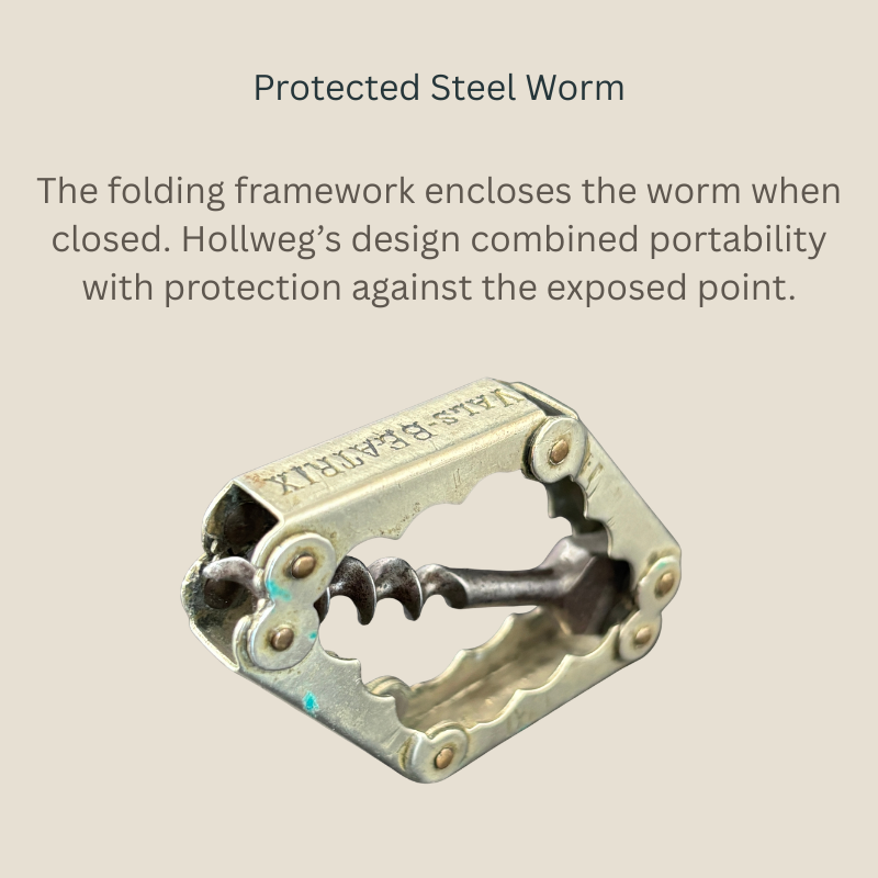 Close view of a Carl Hollweg four-part folding corkscrew showing its articulated metal frame enclosing the protected steel worm when closed.