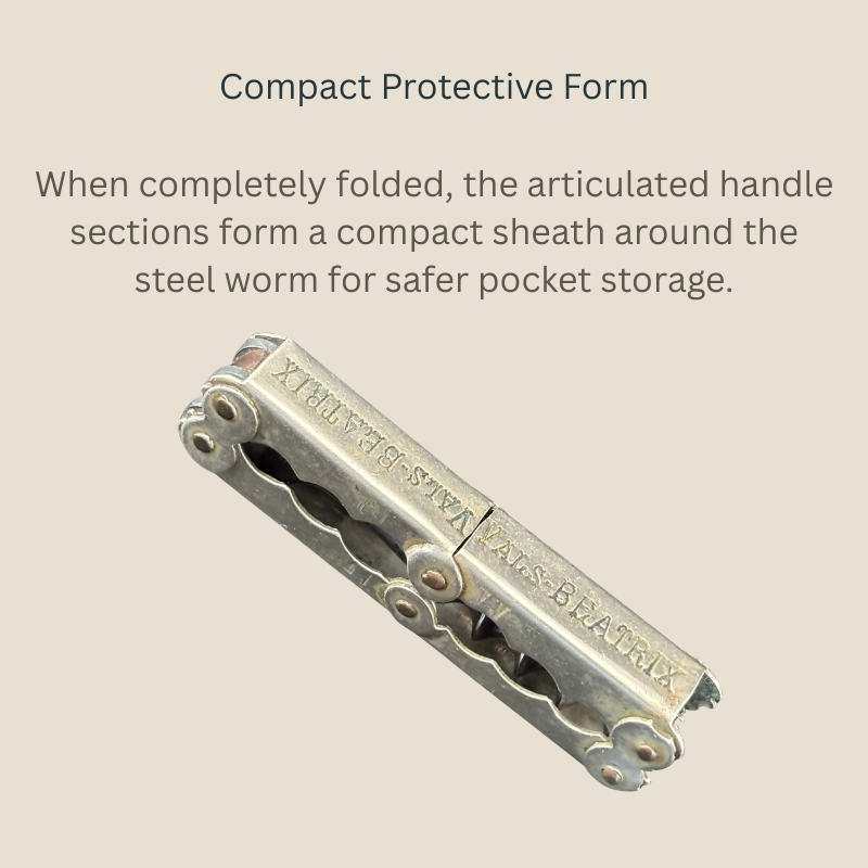 Folded Carl Hollweg articulated steel pocket corkscrew marked VALS-BÉATRIX, with hinged handle sections forming a compact protective sheath around the enclosed worm.