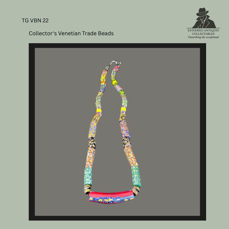 Restrung collector's necklace composed of antique Venetian millefiori and mosaic glass trade beads in a variety of cylindrical, tubular and wound forms, displaying multicoloured floral cane decoration characteristic of Venetian beadmaking traditions.