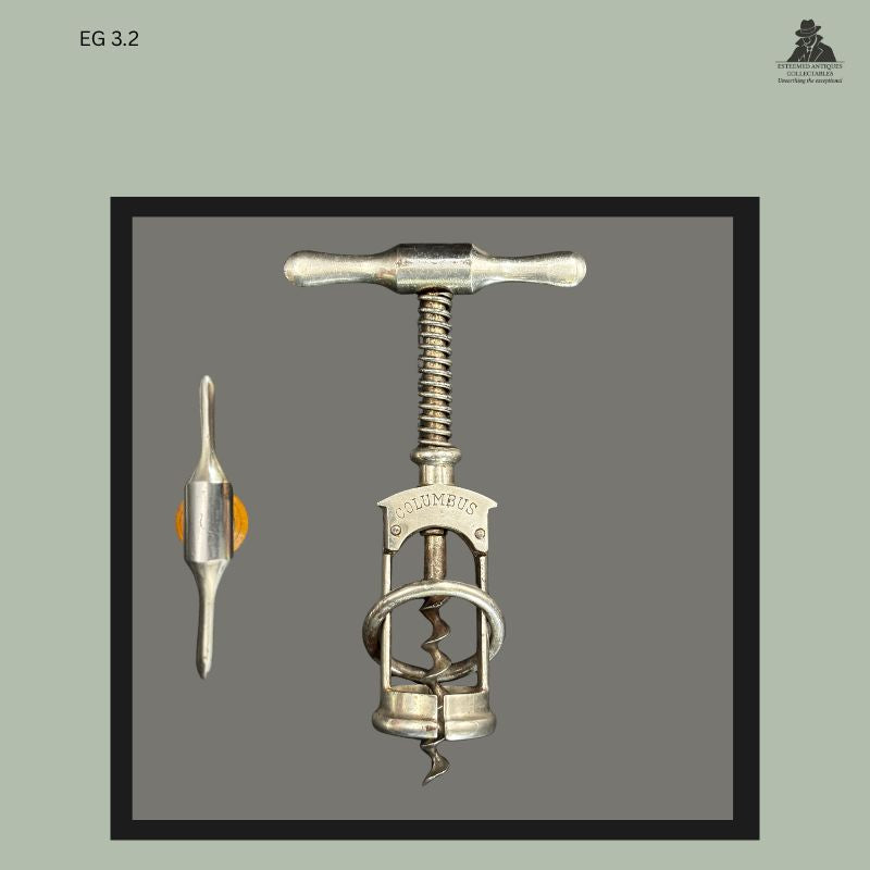 Columbus frame corkscrew with metal T-handle and split-frame extraction mechanism, marked COLUMBUS, shown with side profile view highlighting the cast metal handle and patented German mechanical design.