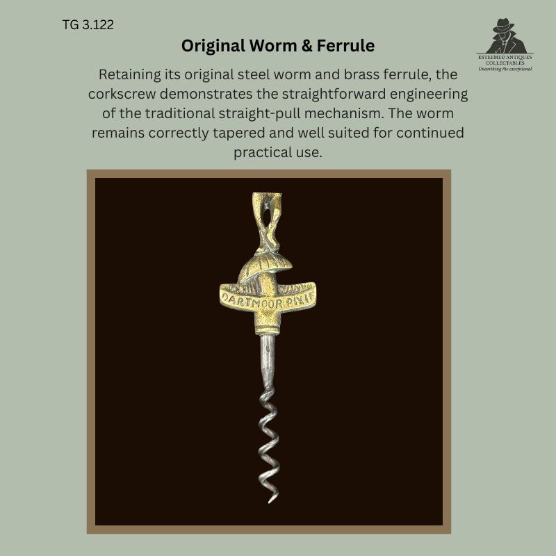 Detail of a Dartmoor Pixie figural straight-pull corkscrew showing the original tapered steel worm and brass ferrule beneath the cast brass handle, England, circa 1905–1925, from the Thomas Guenther Collection.