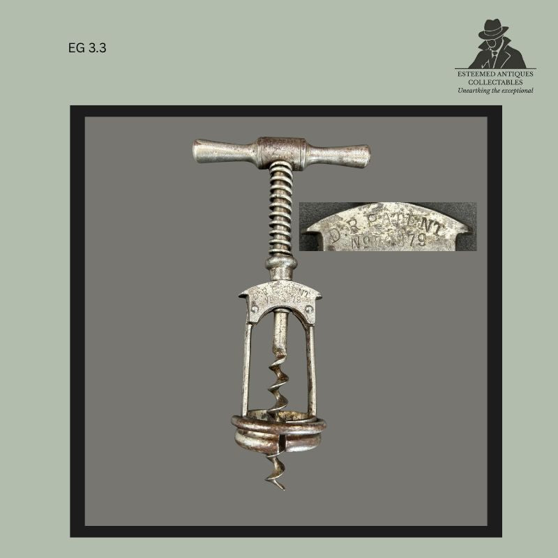 Detailed front view of an early Columbus corkscrew with enlarged close-up of the D.R. PATENT No. 70879 marking, illustrating an early version of the patented German frame corkscrew mechanism.