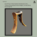 East African carved wooden headrest attributed to the Turkana–Karamojong cultural region of Kenya and Uganda, formed with a curved rectangular head support and two tapering legs joined by a wrapped metal stabilising element, from the Egon Guenther Collection.