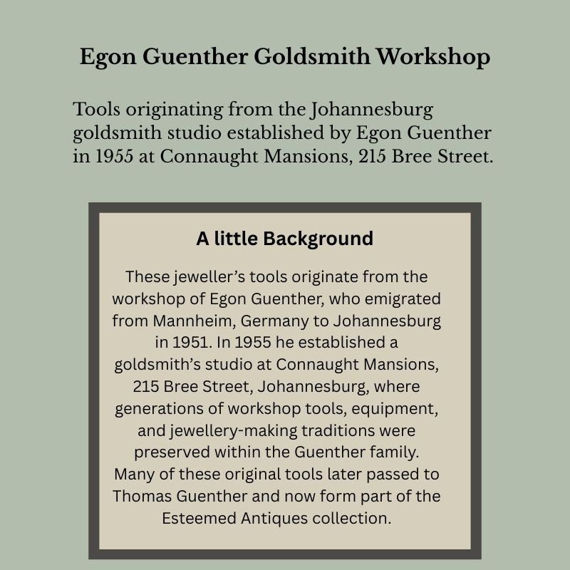 Informational panel describing the Egon Guenther goldsmith workshop established in 1955 at Connaught Mansions, 215 Bree Street, Johannesburg, outlining the history of jewellery-making tools and workshop equipment preserved within the Guenther family collection.