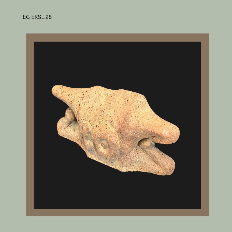 Terracotta animal form sculpture attributed to Ezrom Legae, South Africa, showing an elongated abstract head with open mouth and textured hand-modelled surface from the Egon Guenther Collection.