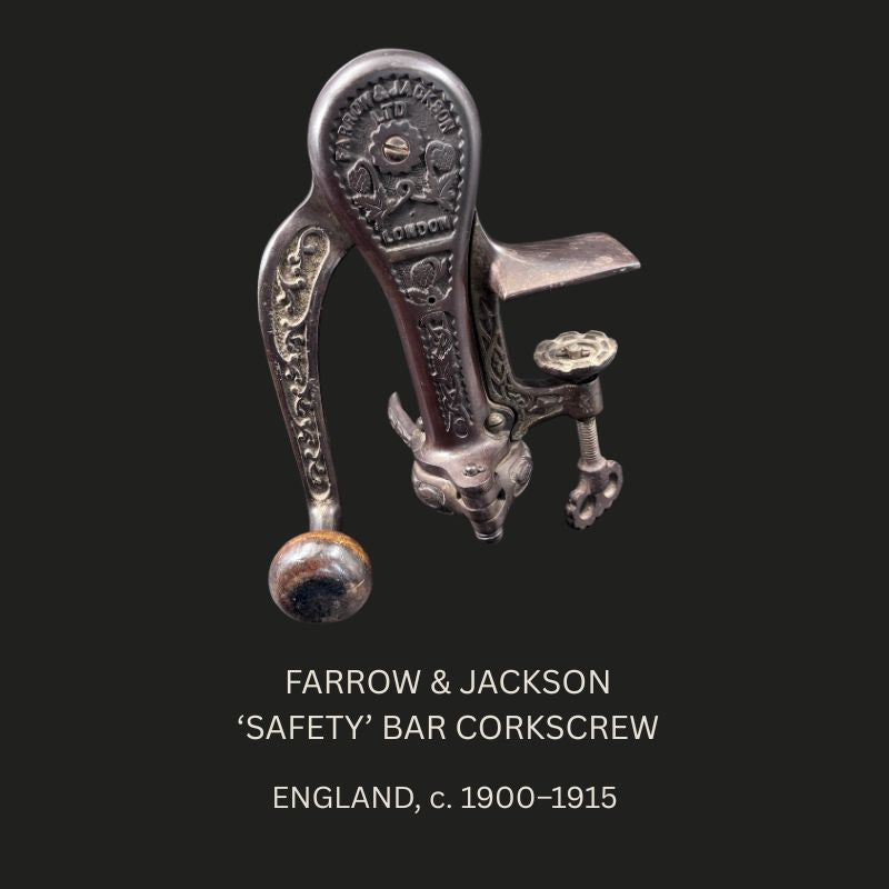 Farrow & Jackson Ltd of London counter-mounted cast-iron “Safety” bar corkscrew, England, c. 1900–1915, shown with its decorated lever mechanism, wooden crank knob and mounting clamp.