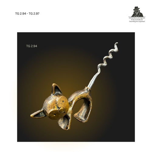 Figural cat corkscrew with cast brass animal-form handle and steel worm, modelled as a stylised seated cat with rounded head, pointed ears and curved body forming the grip, collectible barware and corkscrew design piece from the Thomas Guenther Collection.
