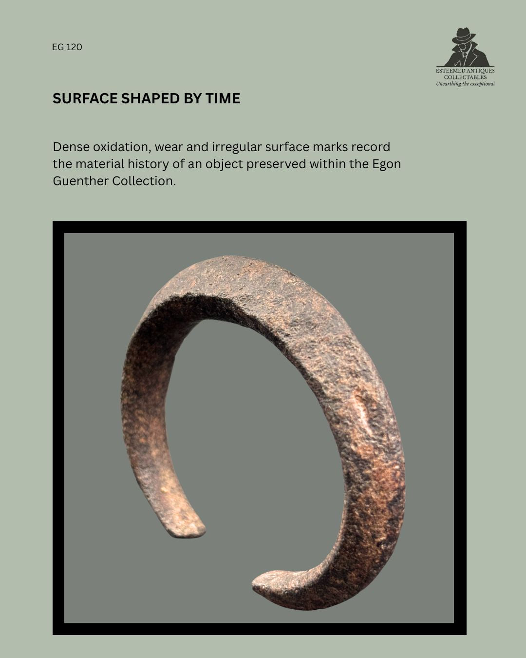 Detail view of forged iron manilla-form currency bracelet EG 120, showing dense oxidation, wear and irregular surface marks from the Egon Guenther Collection.
