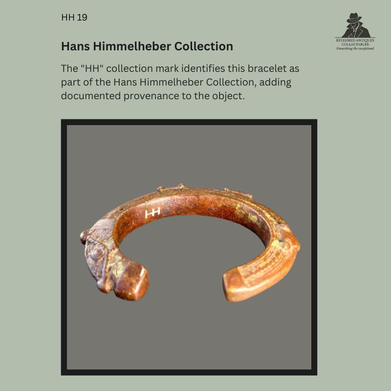 Interior view of the West African cast copper-brass prestige bracelet showing the incised "HH" collection mark, identifying documented provenance to the Hans Himmelheber Collection.