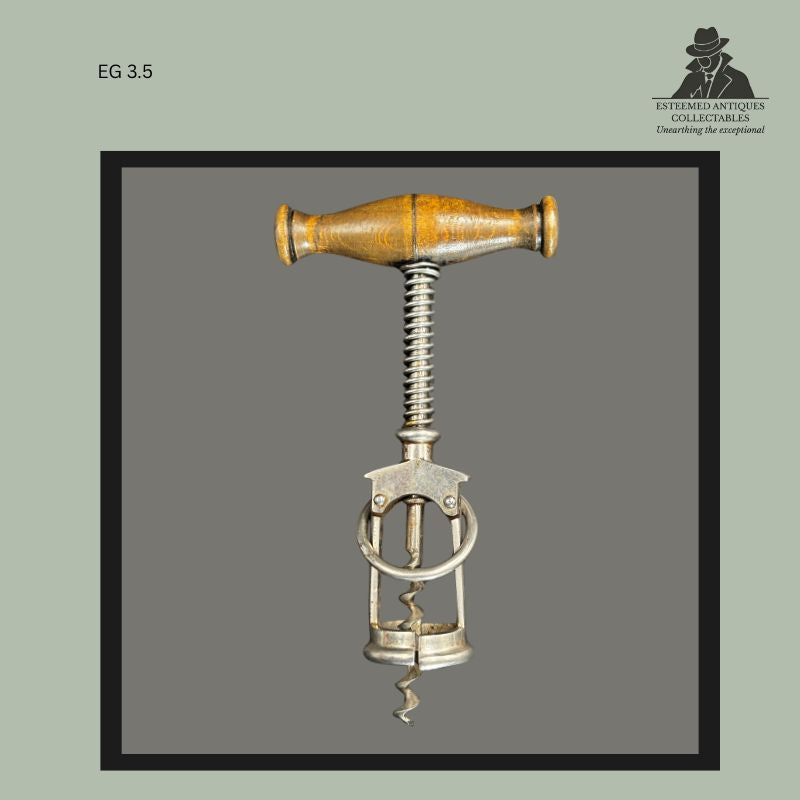 Rear view of a J.A. Henckels Zwillingswerk Columbus-frame corkscrew with turned wooden handle, showing the patented split-frame construction and circular guide ring characteristic of the Becker design.