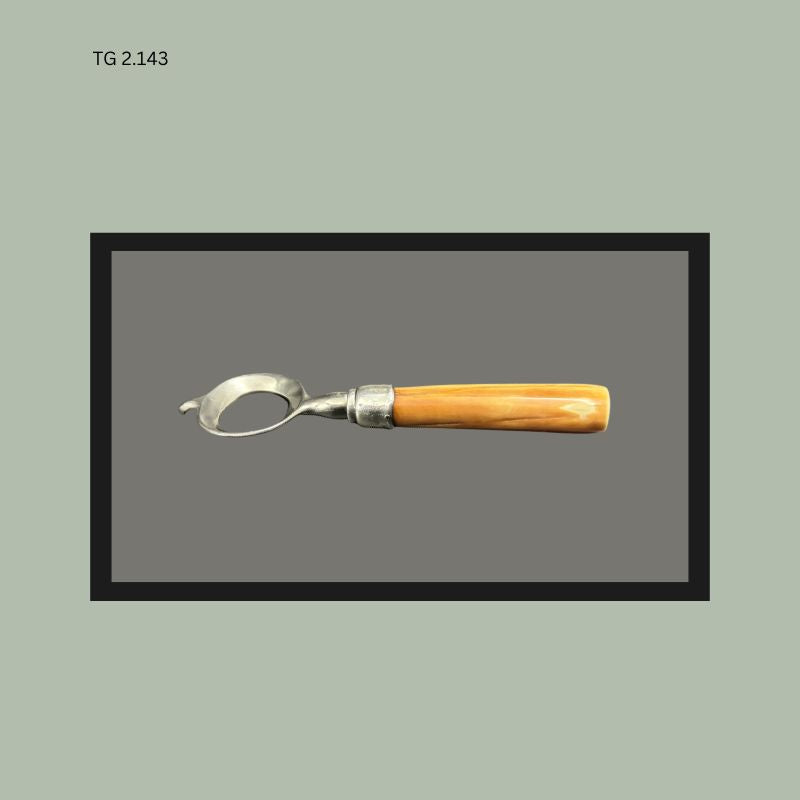 John Hasselbring patent 1906 “Baltimore Loop Seal” corkscrew with circular seal cutter, metal frame, sterling silver collar mount, and polished horn handle, American corkscrew design from the Thomas Guenther Collection.