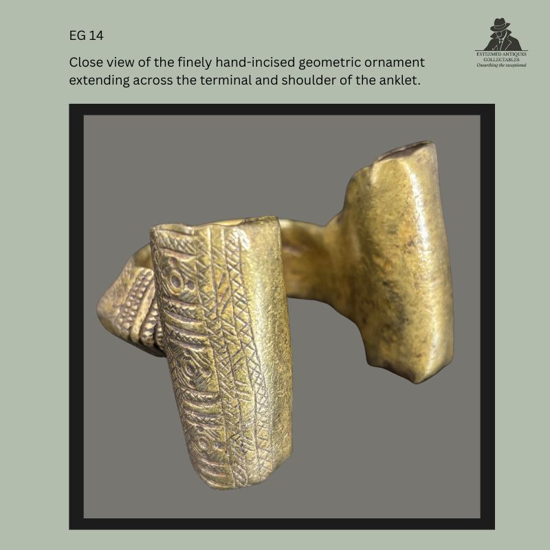 Close-up detail of the hand-incised geometric decoration on the terminal and shoulder of a cast brass Kasena Gurunsi anklet from northern Ghana, showing finely engraved linear and circular motifs from the Egon Guenther Collection.