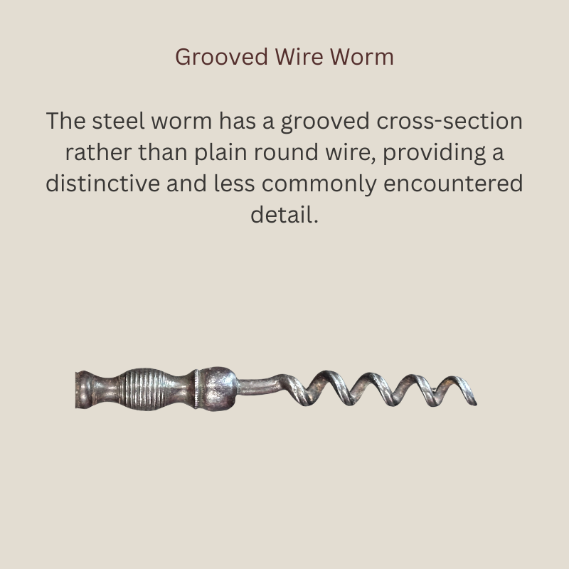 Detail of the grooved steel wire worm and decoratively turned shank on a late Victorian English straight-pull corkscrew, c.1880–1900.
