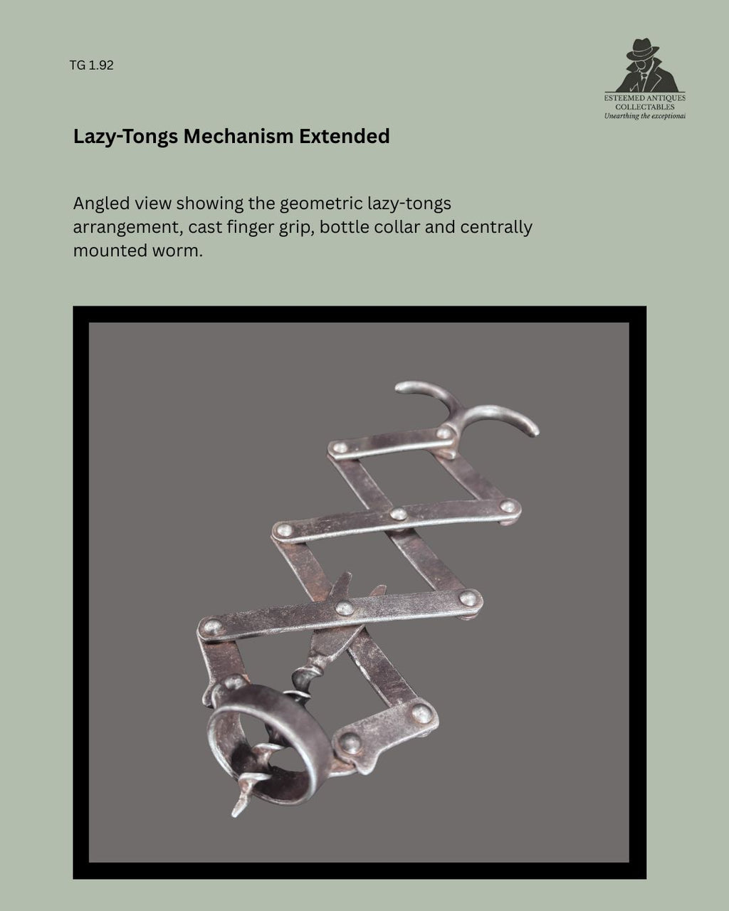 Angled view of the antique metal lazy-tongs corkscrew fully extended, showing the articulated geometric linkage, cast finger grip, bottle collar and centrally mounted worm.
