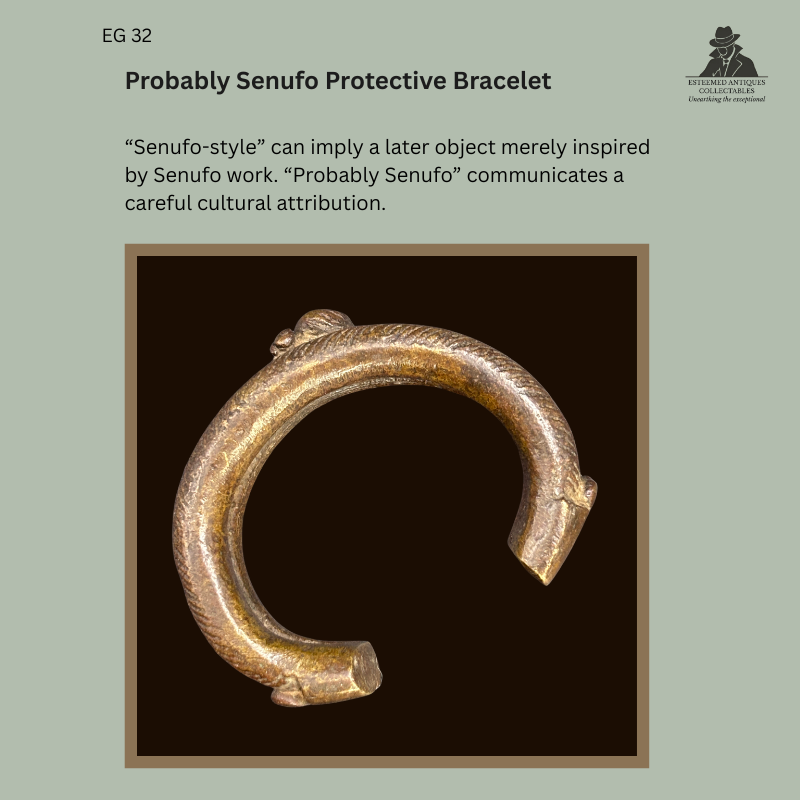 Catalogue title slide for EG 32, a probably Senufo cast-metal protective bracelet of open circular form with zoomorphic projections and a worn golden-brown surface.
