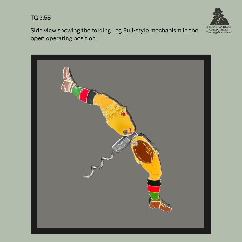 Side profile of a novelty rugby player Leg Pull corkscrew showing the folding articulated mechanism fully extended, with painted enamel decoration, exposed steel worm, and metal lever assembly in the open operating position from the Thomas Guenther Collection.