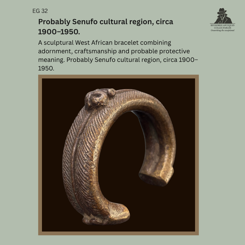 Catalogue panel showing EG 32, a sculptural West African zoomorphic bracelet with engraved surface decoration, probably from the Senufo cultural region, circa 1900–1950.