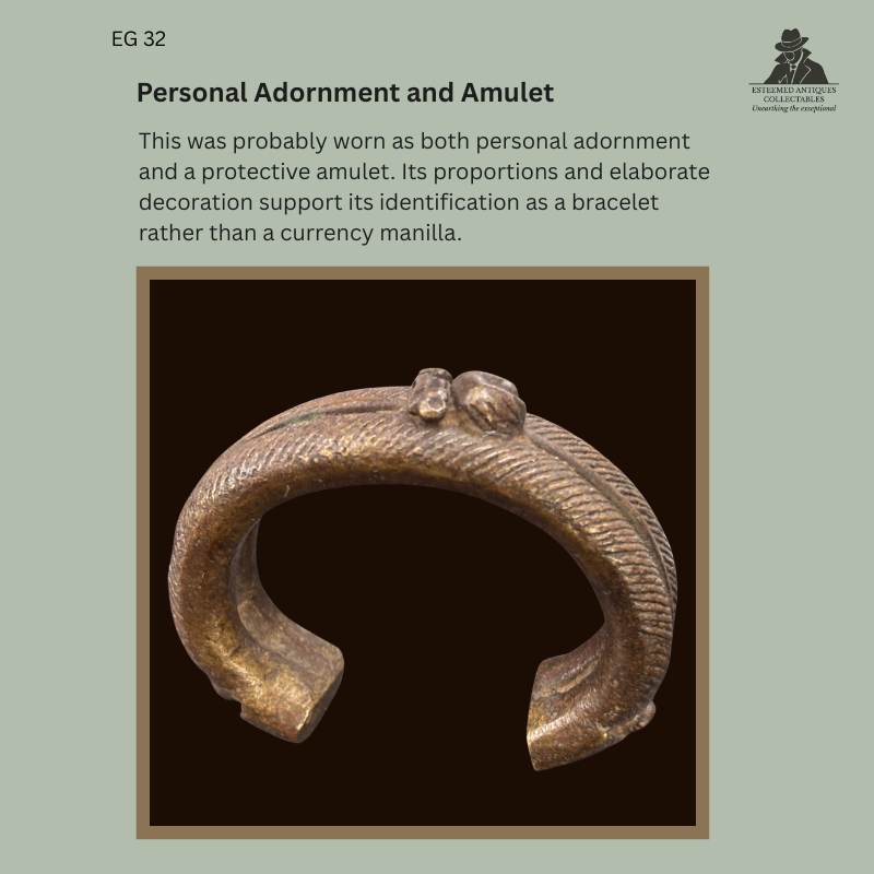 Catalogue slide showing EG 32, a Senufo-attributed cast metal bracelet with zoomorphic ornament and textured decoration, identified as personal adornment and a protective amulet.