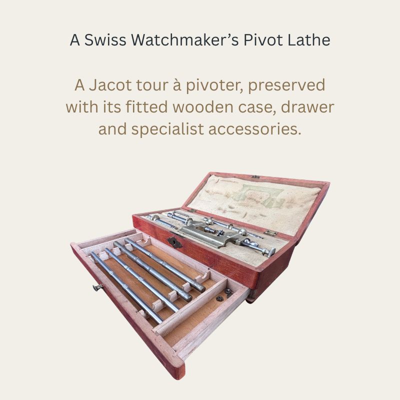 Swiss watchmaker’s Jacot pivot lathe in an open fitted wooden case, with the front drawer displaying four steel burnishers and other accessories.