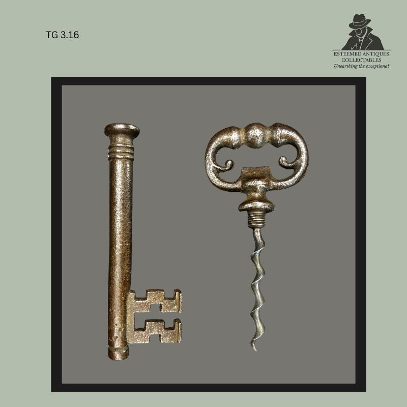Victorian combination corkscrew with cast metal scroll handle and steel worm shown alongside its matching cylindrical protective sheath, an wine accessory dating to the late 19th century from the Thomas Guenther Collection.