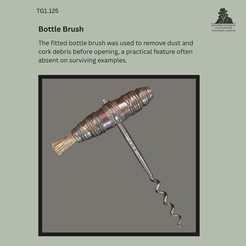 Close-up of the fitted natural bristle bottle brush housed within the turned hardwood T-handle of a Victorian direct pull corkscrew, England, c.1880–1900, illustrating the integrated cleaning feature used to remove dust and cork debris before opening bottles.