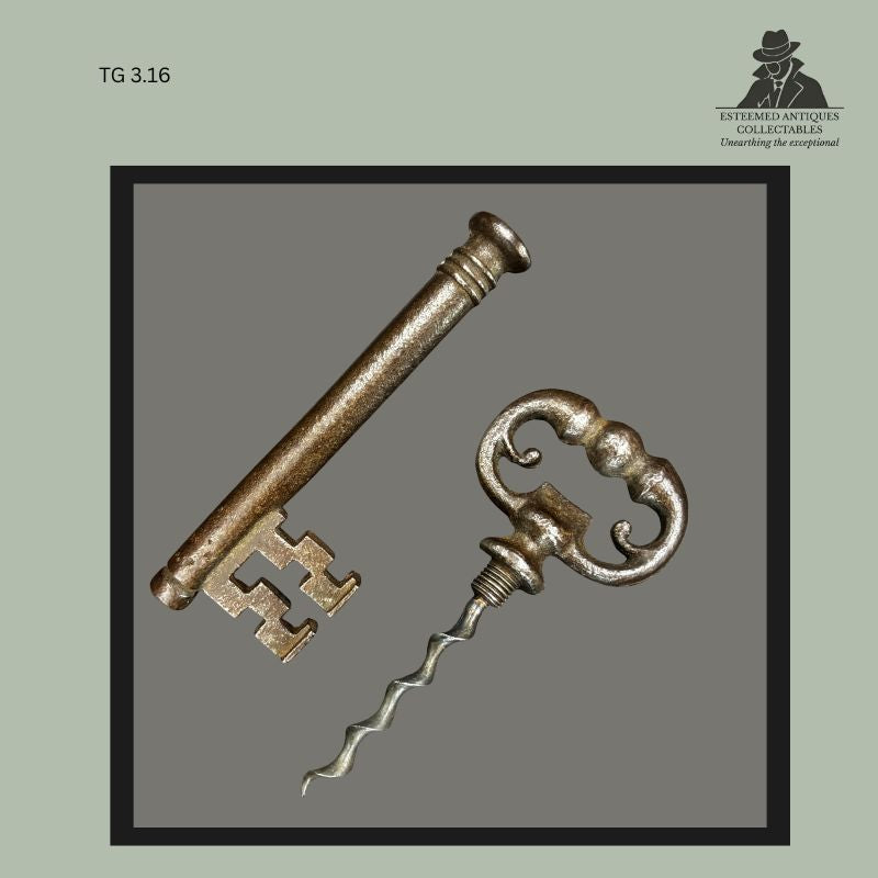 Victorian cast metal openwork bow corkscrew with scrolling frame and triple-knop grip, shown alongside a matching decorative key, featuring a steel worm and ornate collector-grade design typical of late 19th-century barware and mechanical accessories.