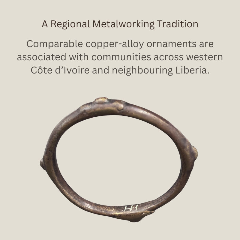 Circular copper-alloy bangle with an irregular hand-finished profile and raised surface features, associated with metalworking traditions of western Côte d’Ivoire and neighbouring Liberia.