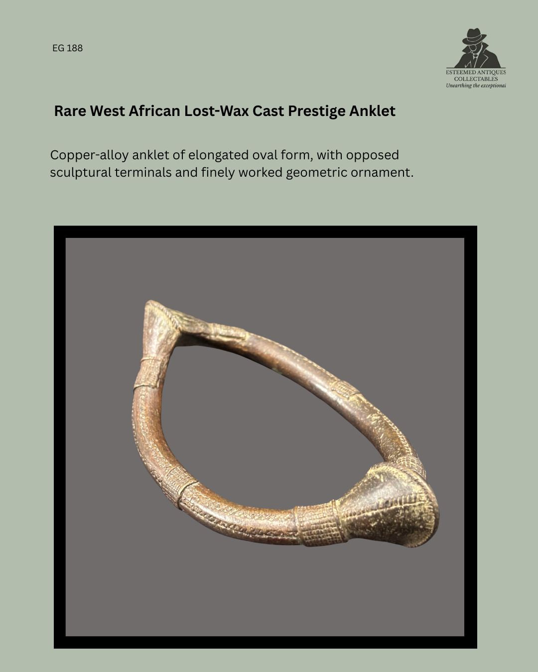 West African lost-wax cast copper-alloy prestige anklet of elongated oval form, showing opposed sculptural terminals and finely worked geometric ornament, early 20th century, Egon Guenther Collection.