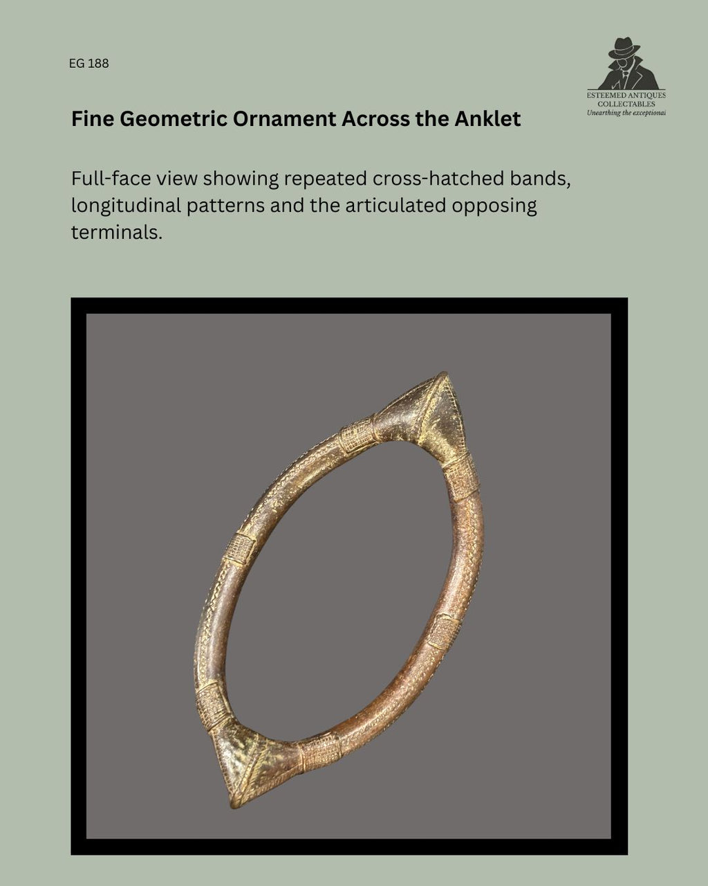 Full-face view of West African lost-wax cast copper-brass prestige anklet EG 188, showing repeated cross-hatched bands, longitudinal incised ornament and opposing triangular terminals.