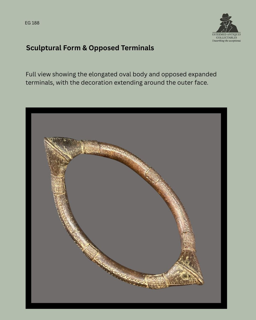 Full view of West African lost-wax cast copper-alloy prestige anklet EG 188, showing the elongated oval form, opposed expanded terminals and finely patterned decoration extending around the outer face.