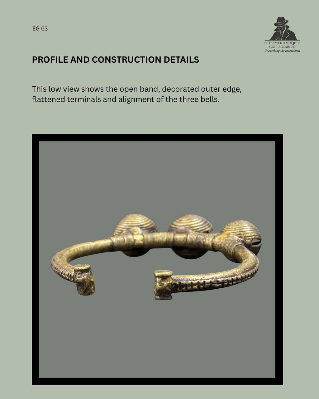 Low-profile view of West African copper-alloy three-bell bracelet EG 63, showing the open decorated band, flattened terminals and alignment of the three ribbed bells.